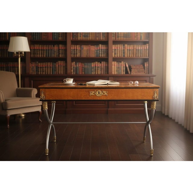 This elegant vintage writing desk reflects the timeless sophistication of French Empire and neoclassical design. Crafted...