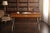 This elegant vintage writing desk reflects the timeless sophistication of French Empire and neoclassical design. Crafted...