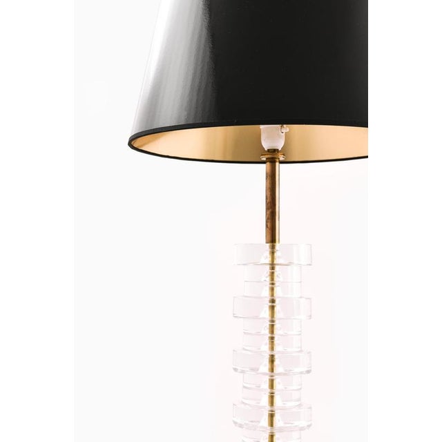 This rare table lamp, model rd1986, designed by carl fagerlund and produced by orrefors in sweden during the 1960s, is a...