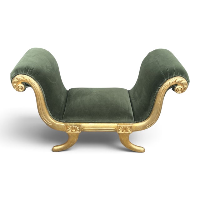 This vintage giltwood scroll-arm bench combines Neoclassical-inspired detailing with the dramatic appeal of Hollywood...
