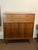 1960's Mid-Century Modern tallboy/highboy by Basic Witz. This line features 5 dovetailed drawers, tapered legs, paneled...