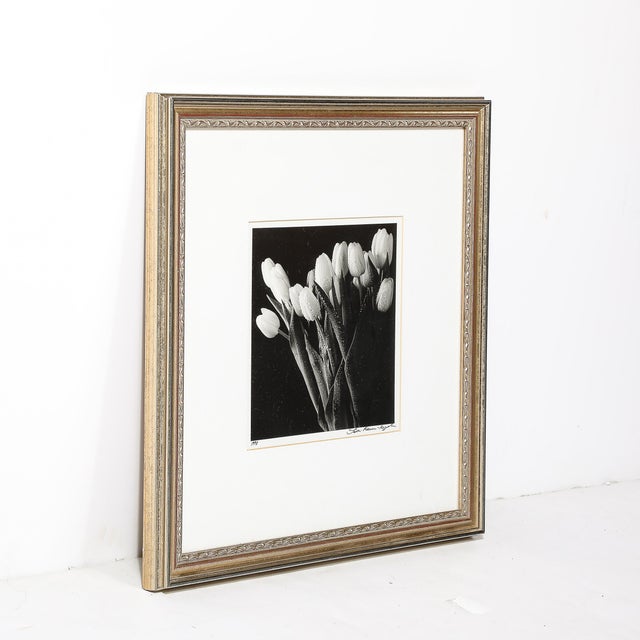 This Modernist Black and White Still Life Photograph of Tulips originates from the United States, C.1998. A still life...