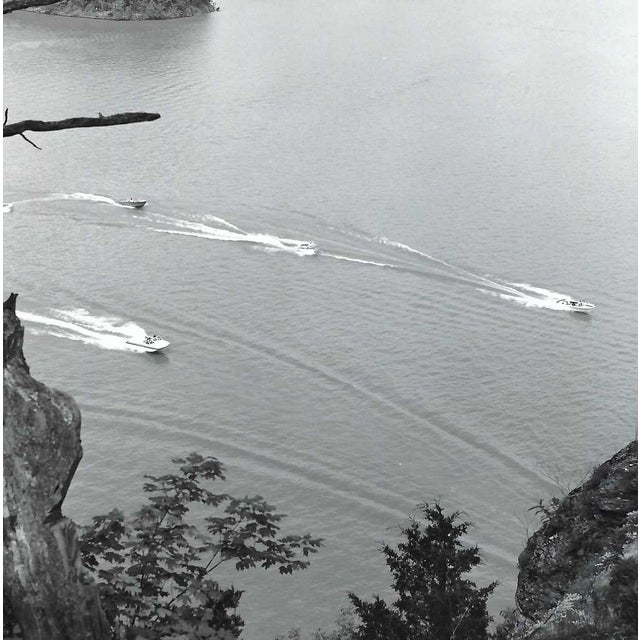 1960s black and white photograph of boats in a lake, probably a mountain lake. The back is blank. Combined shipping...