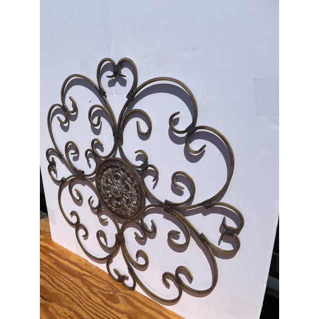 Here we have a really nice vintage celtic/spanish sun home or garden wall hanging steel sculpture. Nice looking piece....