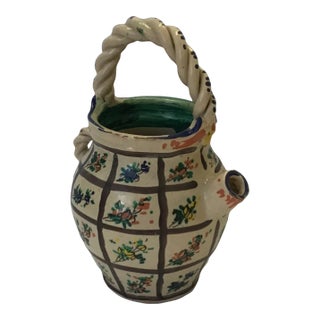Italian Clay Worked Floral Water Jug For Sale