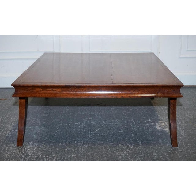 This stunning antique Art Deco coffee table is a superb example of early 20th-century design, crafted in golden oak and...