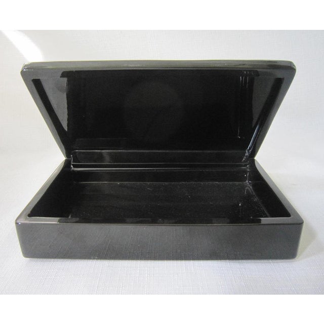 Abstract design small Modernist enamel lacquer box. It measres 7"L x 4.25"W x 1.5"H and is in excellent condition....