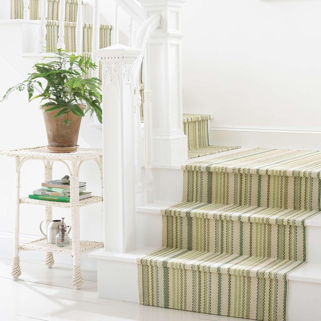 A chambray stripe in variegated shades of Moss, Juniper, Seaglass and Chartreuse on an Ivory ground, updates our...