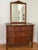 Antique tiger oak chest of drawers with serpentine drawers and original hardware. Mirror shown leaning on dresser top,...