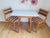A stylish and practical vintage mid century dining set comprising a 1960s light blue formica drop-leaf kitchen table and a...