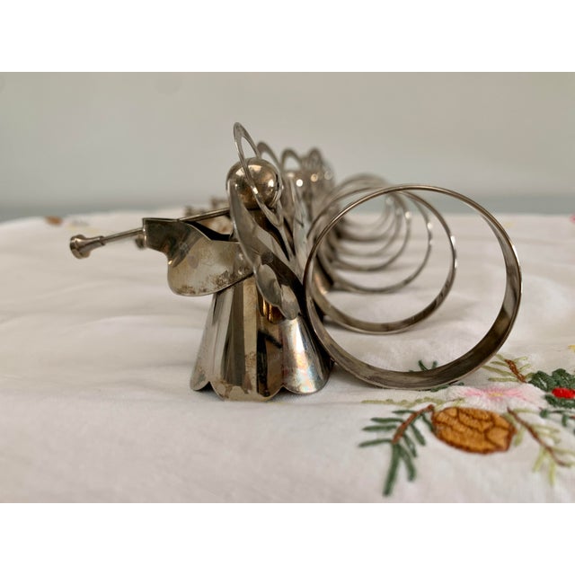 Vintage set of silver plate, heralding angels napkin rings. A nice addition to the Christmas settings of your holiday...
