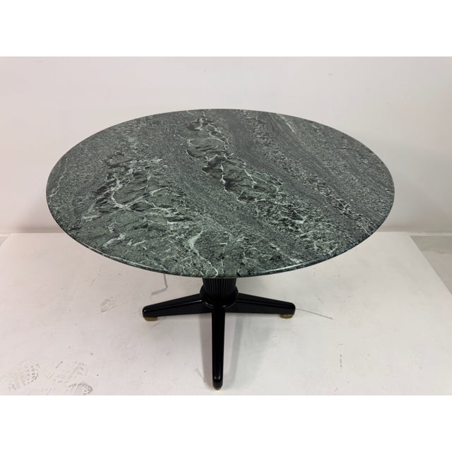 Ebonised Centre Table with Verde Alpi Marble Top, Italy, 1950s A striking Italian centre table from the 1950s, pairing...