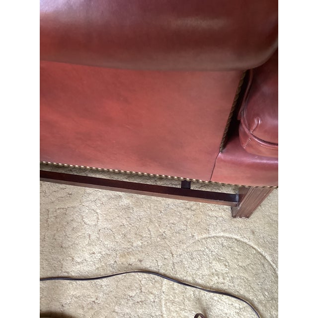 Animal Skin 1975 Hancock & Moore Burgundy Full-Grain Leather Wingback Executive Armchair and Ottoman Set. Tufted For Sale - Image 7 of 9