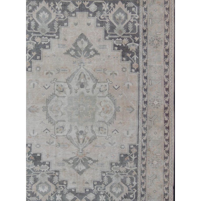Measures: 8'0 x 11'0 Vintage Turkish Oushak Rug in Soft Gray, Pale Blue, and Washed Charcoal. Keivan Woven Arts rug...
