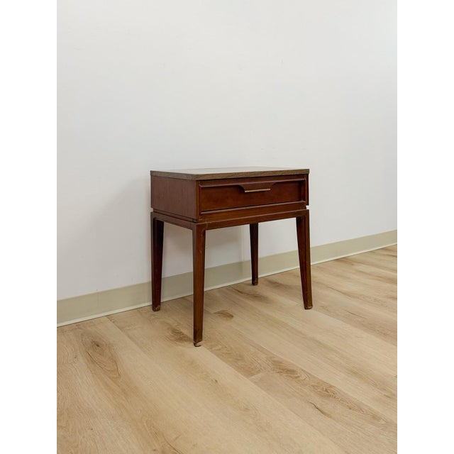 This clean and well-made vintage Basic Witz mid-century modern nightstand is a solid and collectible MCM bedside find. The...