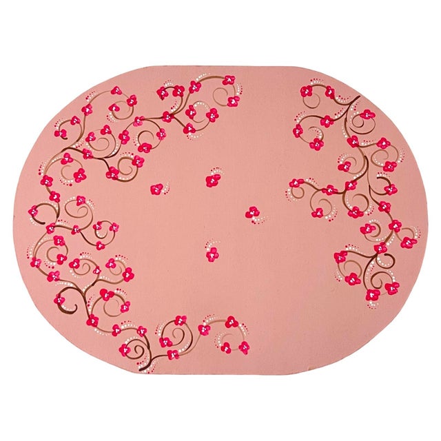 A whimsical and highly decorative set of seven hand-painted hardboard placemats, beautifully composed in a coordinated...