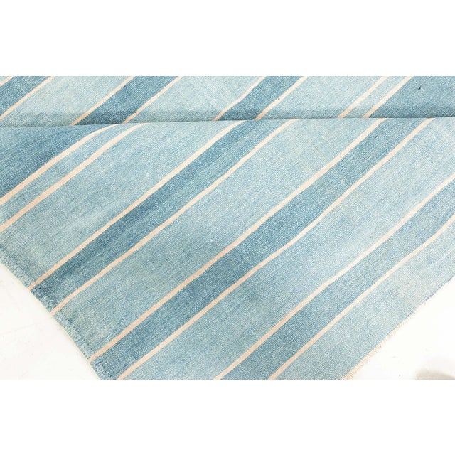 Indian Dhurrie Runner Size: 5'3" × 13'8" (160 × 416 cm) This vintage Indian Dhurrie runner exemplifies the elegance of...