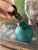 Gorgeous decanter, made in Portugal, and presented in a rich, jewel tone, teal green, with a black stopper, this hand made...