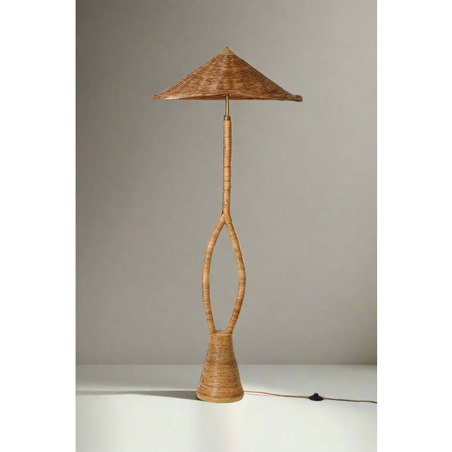 The OTON Floor Lamp is an Italian-inspired rattan floor lamp of quiet authority — organic in material, refined in form....