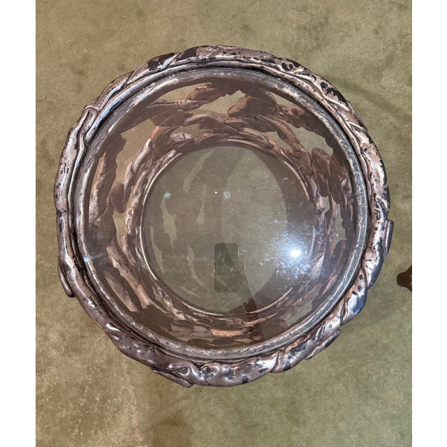 This is a dramatic sculptural accent table in the Hollywood Regency spirit, with a drum-shaped base built from densely...