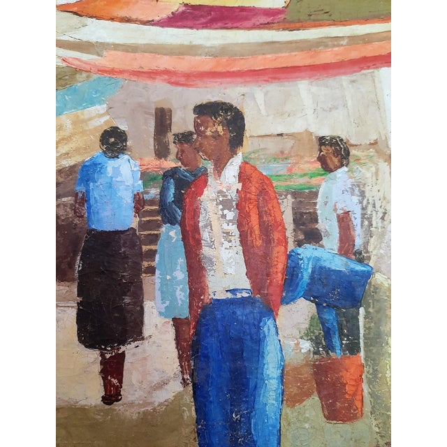This early mid-century Latino oil painting on canvas features a central figure in a vibrant market scene, adorned with...
