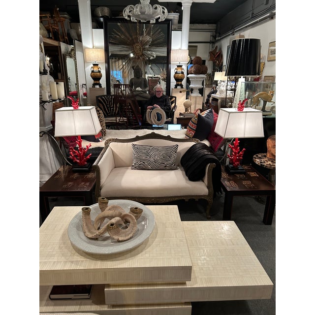 Super stylish pair of faux coral table lamps painted a striking red with black bases. Even the finials are stylish! The...