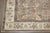 An early 20th century room size Persian Heriz in predominantly brown. Measures: 8'8'' x 11'1''.