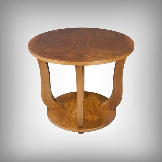 This Art Deco side table captivates with its perfect balance of geometry, elegance, and the beauty of its wood. Its...