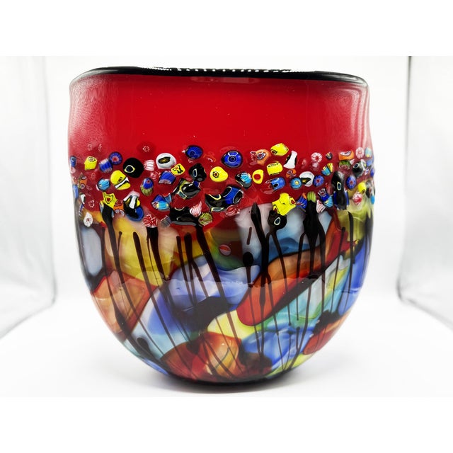 A fascinating artistic vase made in Murano in the 80s, characterized by an extraordinary workmanship in blown glass with a...