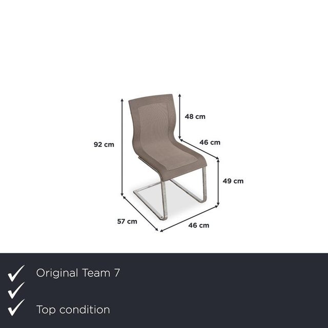 Introducing Team 7 Magnum Stricktex 4-piece chair set in chrome, grey, and beige fabric. I have official proof of...