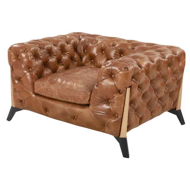 "We give you Olivia, a sophisticated contemporary spin on a classic Chesterfield design. Our signature leather with a...