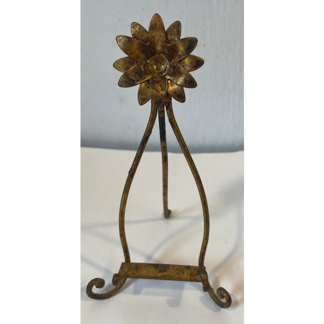 Nice Italian gilt metal petite easel with a flower design.