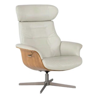 Vintage Amala Beige Bone Genuine Leather Reclining Swivel Armchair With Adjustable Headrest. For Sale