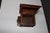 Antique Black Forest cigar humidor crafted in dark-stained wood with a hinged, pitched roof lid, carved decorative...