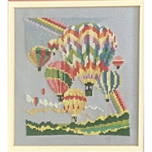 "Up, up and away! In my beautiful, my beautiful balloon!" -The 5th Dimension This needlepoint captures the excitement of...
