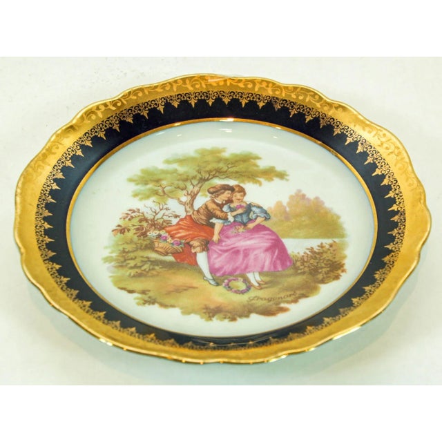 Vintage limoges France fine porcelain round decorative blue and gold. Elegant fine porcelain decorative plate hand painted...