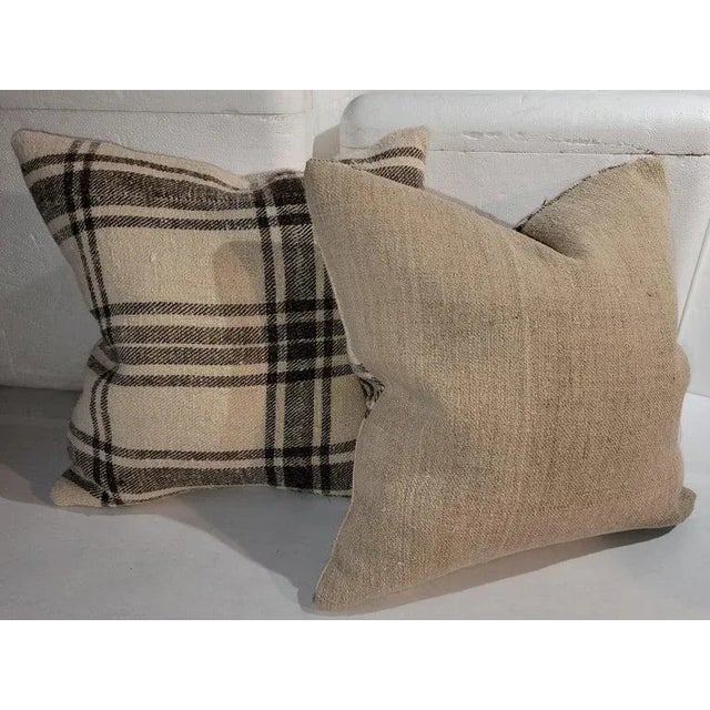 19Th century Homespun linen pillows with natural homespun linen backings.The inserts are down & feather fill.