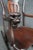 An antique Horner-style rocking chair crafted in mahogany, featuring carved lion head arm terminals, a pierced splat back,...