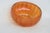This beautiful candy dish / bowl is made of glass. This lovely dish is made in a wonderful marigold orange color with a...