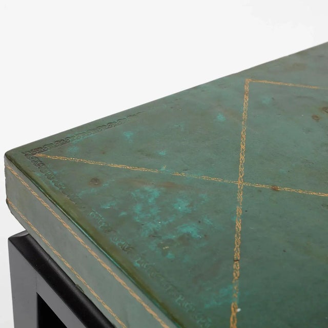 Tommi Parzinger green leather occasional table, model no. 3303, ca. 1955 Ebonized wood, embossed leather. Manufactured by...