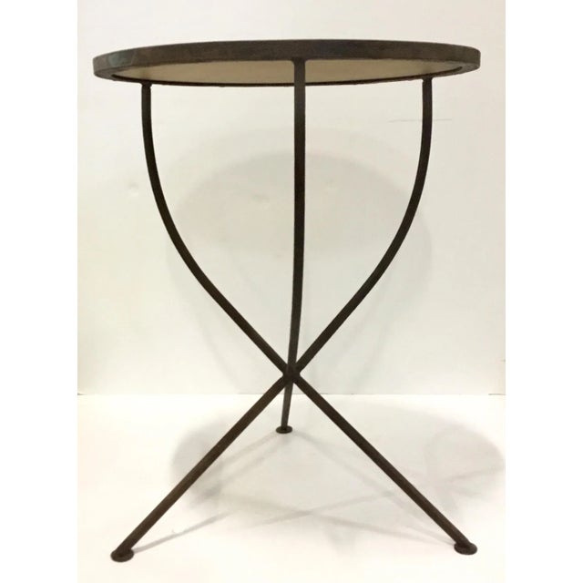 Stylish Arteriors industrial modern round iron side table with multi mini discs, showroom floor sample