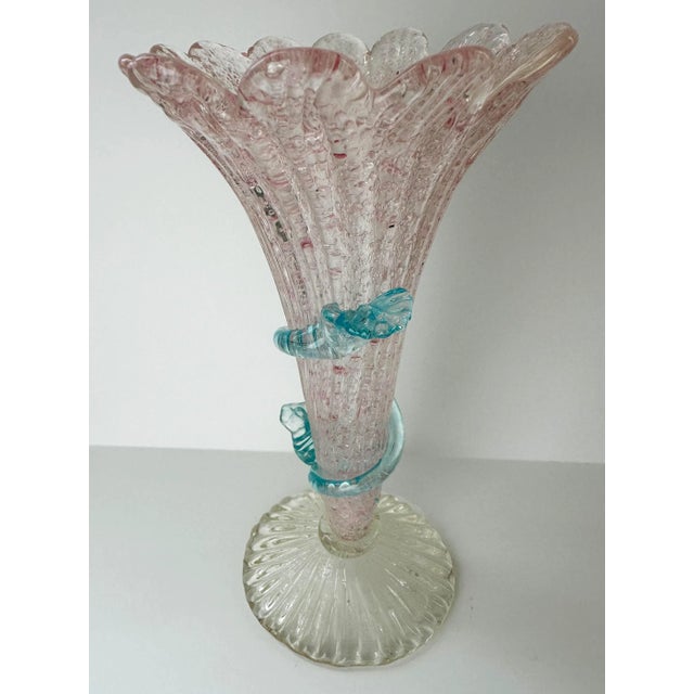 An elegant vintage pink glass epergne made of (overshot) textured glass with blue crystal trailing leaves and vines...