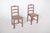 Pair of flowered chairs. Made of solid wood with a traditional design, possibly of rural origin or in the Brazilian...