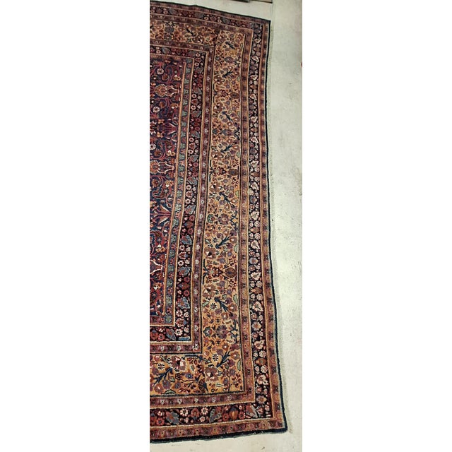 Circa 1910 Persian Doroght handmade wool on cotton foundation .The main field has a dense all over floral motif dominated...