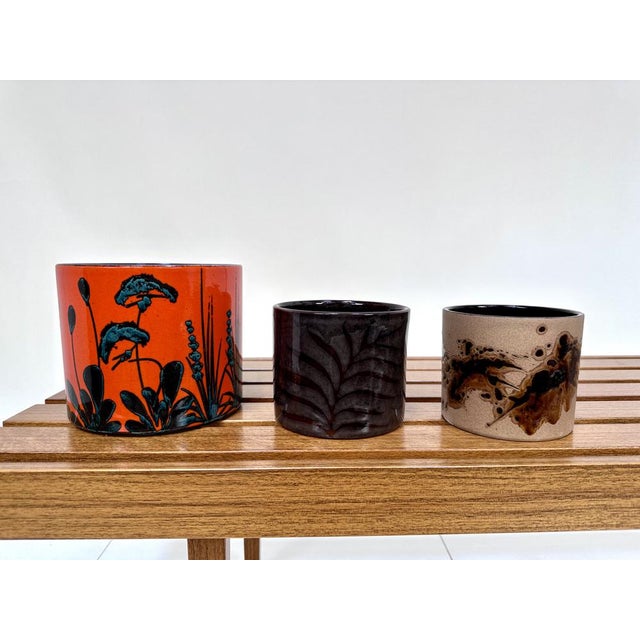 This beautiful set of three high-quality glazed ceramic flower pots from Scheurich and Marei Keramik was manufactured in...