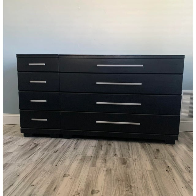Set of dresser and nightstand designed by Raymond Loewy for Mengel Furniture. Each piece features clean modernist lines...