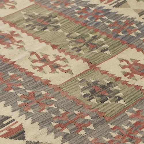 Very decorative kilim, which can be used as a floor and wall hanging. This characteristic rug has light colors and...