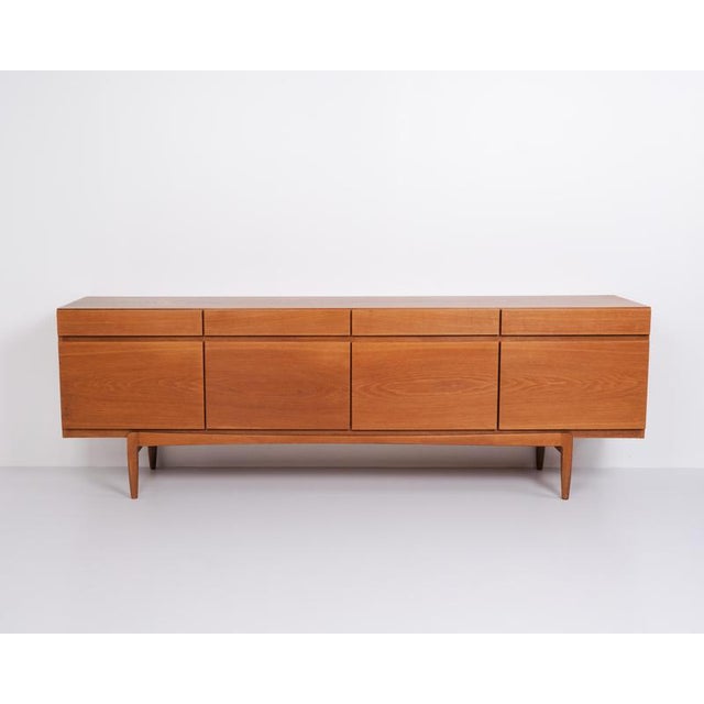 Large oak sideboard, model fa66, designed by ib kofod-larsen and produced by faarup møbelfabrik in the 1960s. The...