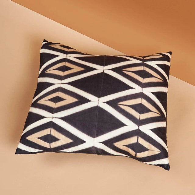 Tisa Black Silk Pillow is luxurious and exquisite with its unique geometric shibori print, which is handcrafted carefully...