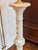 Elegant pedestal made of finely crafted alabaster, dating back to the mid-20th century. The column is richly profiled with...